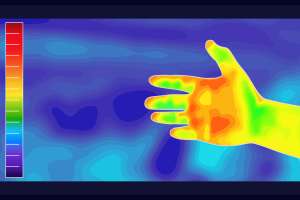 Vector graphic of Thermographic image of hands want to shake hands with someone on blurred background. Hands want to shake hands with someone showing different temperatures in range of colors.